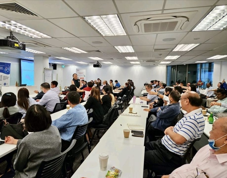 Corporate wellness talk in office setting